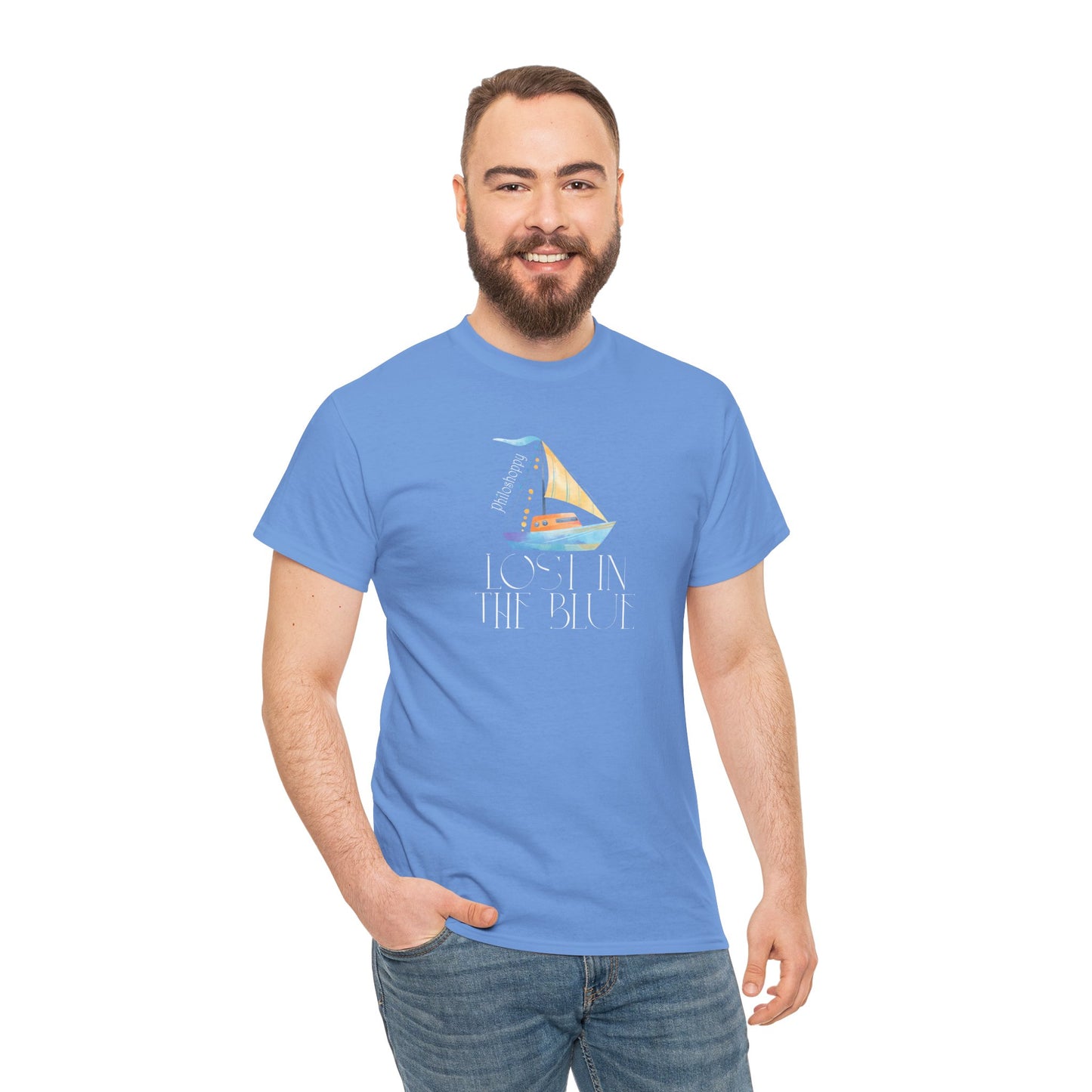 Carolina blue cotton T-shirt from Philoshoppy featuring a sailing boat illustration and the phrase 'lost in the blue', expressing ocean calm, wanderlust, and sea-inspired freedom.