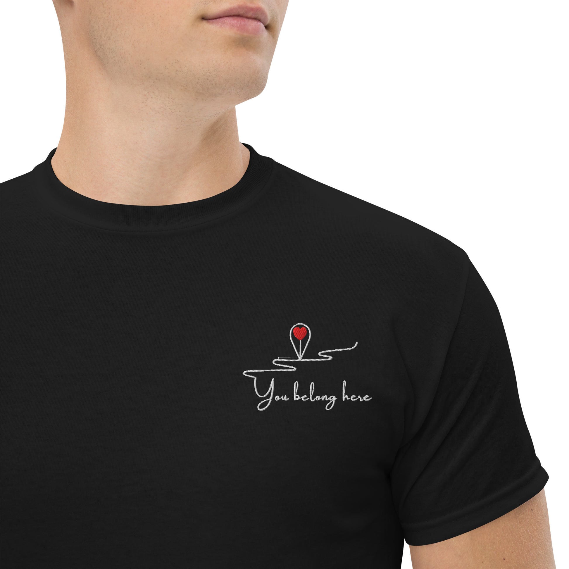 Black unisex cotton t-shirt with “You Belong Here” embroidery, minimalist design, soft and relaxed fit.