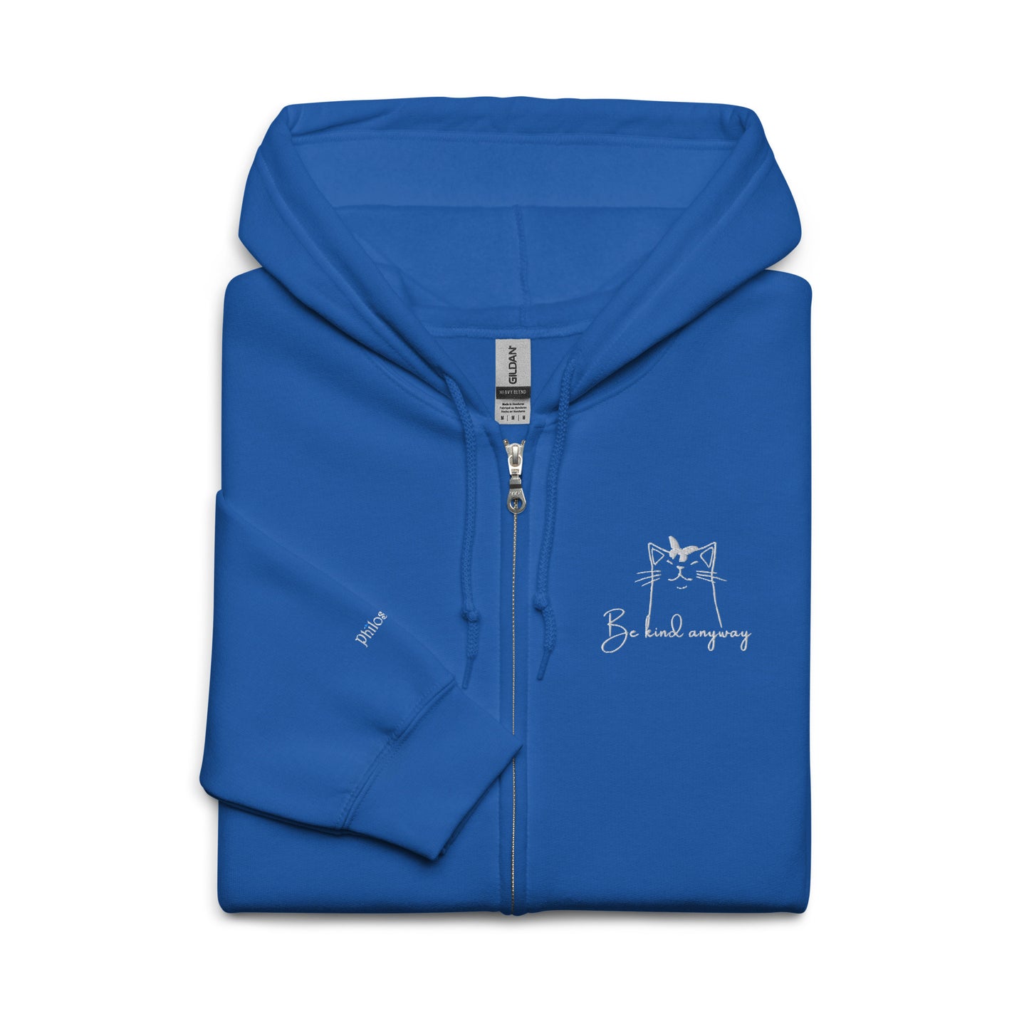 Royal blue unisex cotton zipped hoodie featuring “Be Kind Anyway” embroidery with a minimalist cat, a wearable reminder to lead with kindness, no matter the day.