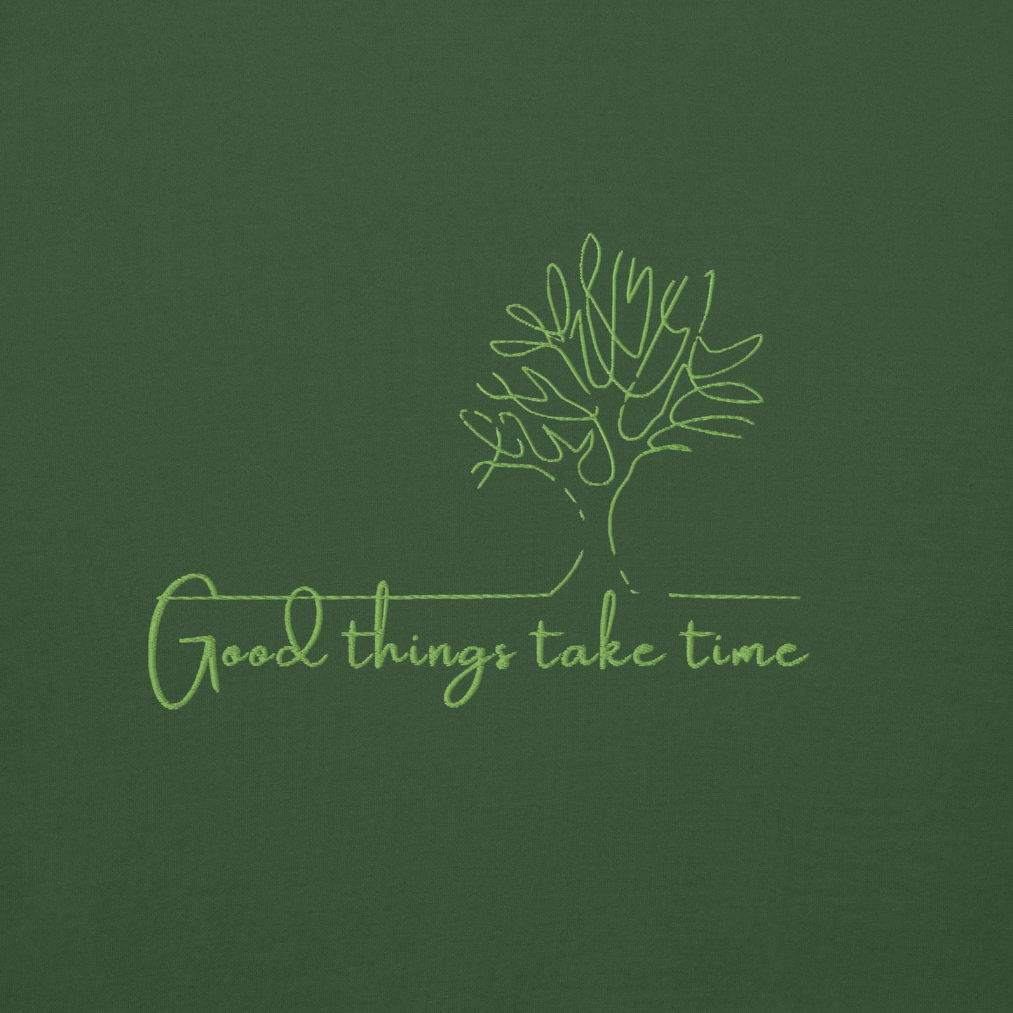 Green cotton hoodie featuring “Good Things Take Time” — a wearable reminder that progress, healing, and beauty unfold at their own pace.