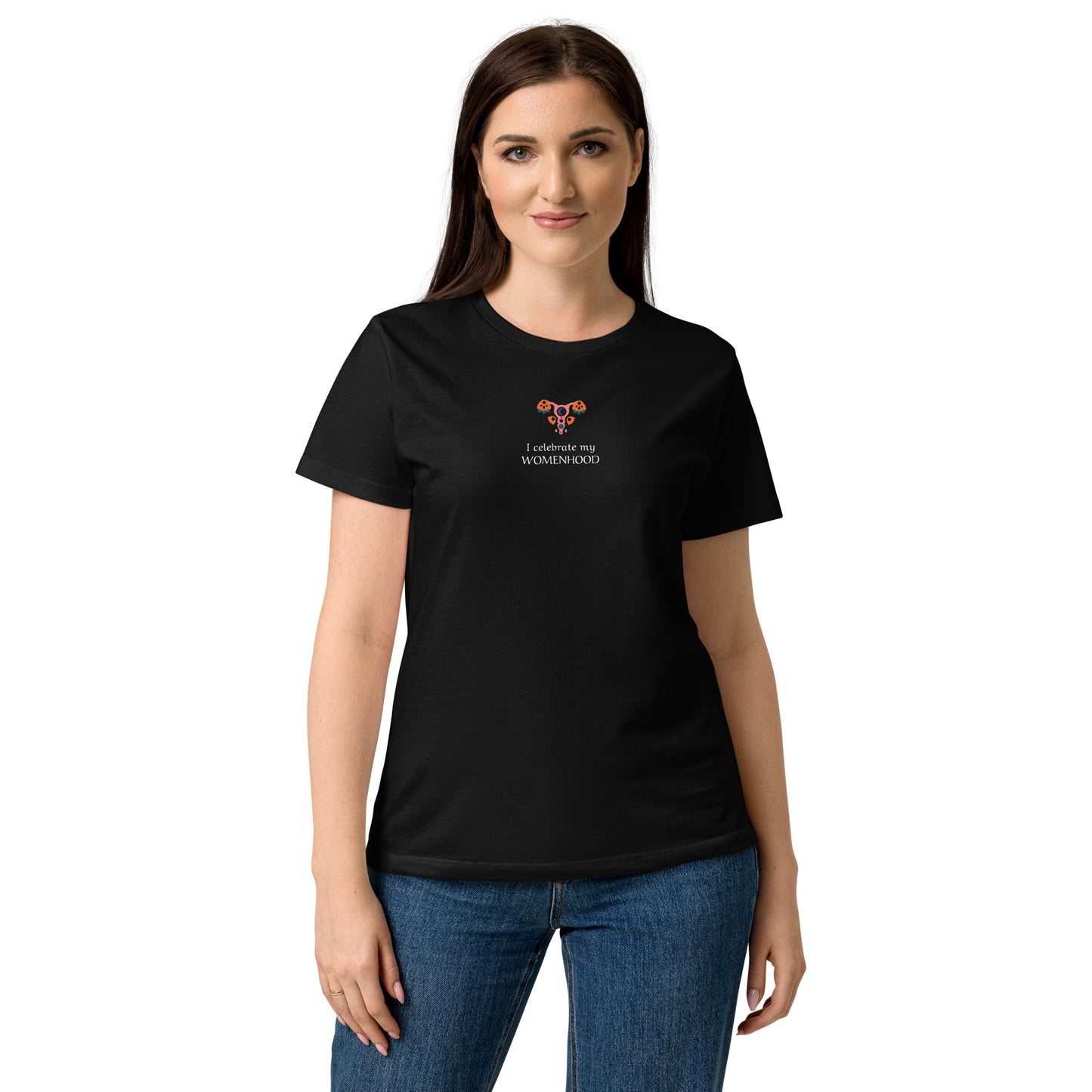 Woman model wearing black “I Celebrate My Womanhood” softstyle T-shirt with feminine symbol graphic.