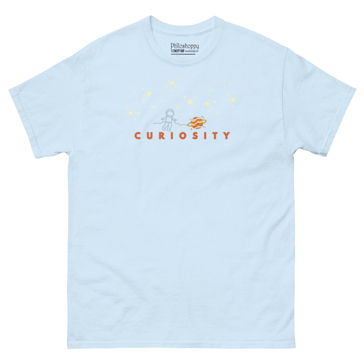 Light blue unisex cotton t-shirt with “Curiosity” text and minimal spaceman exploring stars design, soft, breathable, relaxed fit.