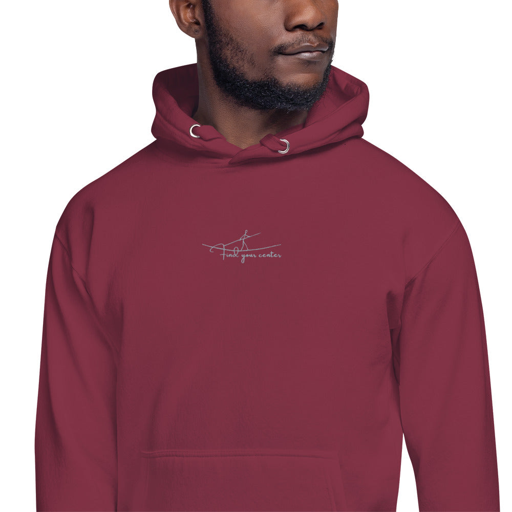Relaxed maroon hoodie with “Find Your Center” text, unisex design symbolizing balance, focus, and mindful living.