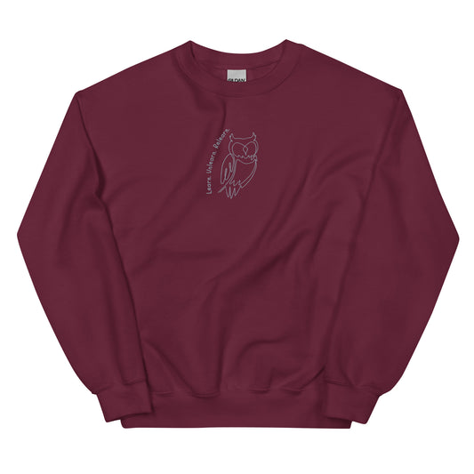 Maroon cotton sweatshirt featuring Learn. Unlearn. Relearn. embroidery with an owl, a wearable reminder that growth is a continuous journey of insight, humility, and adaptability.