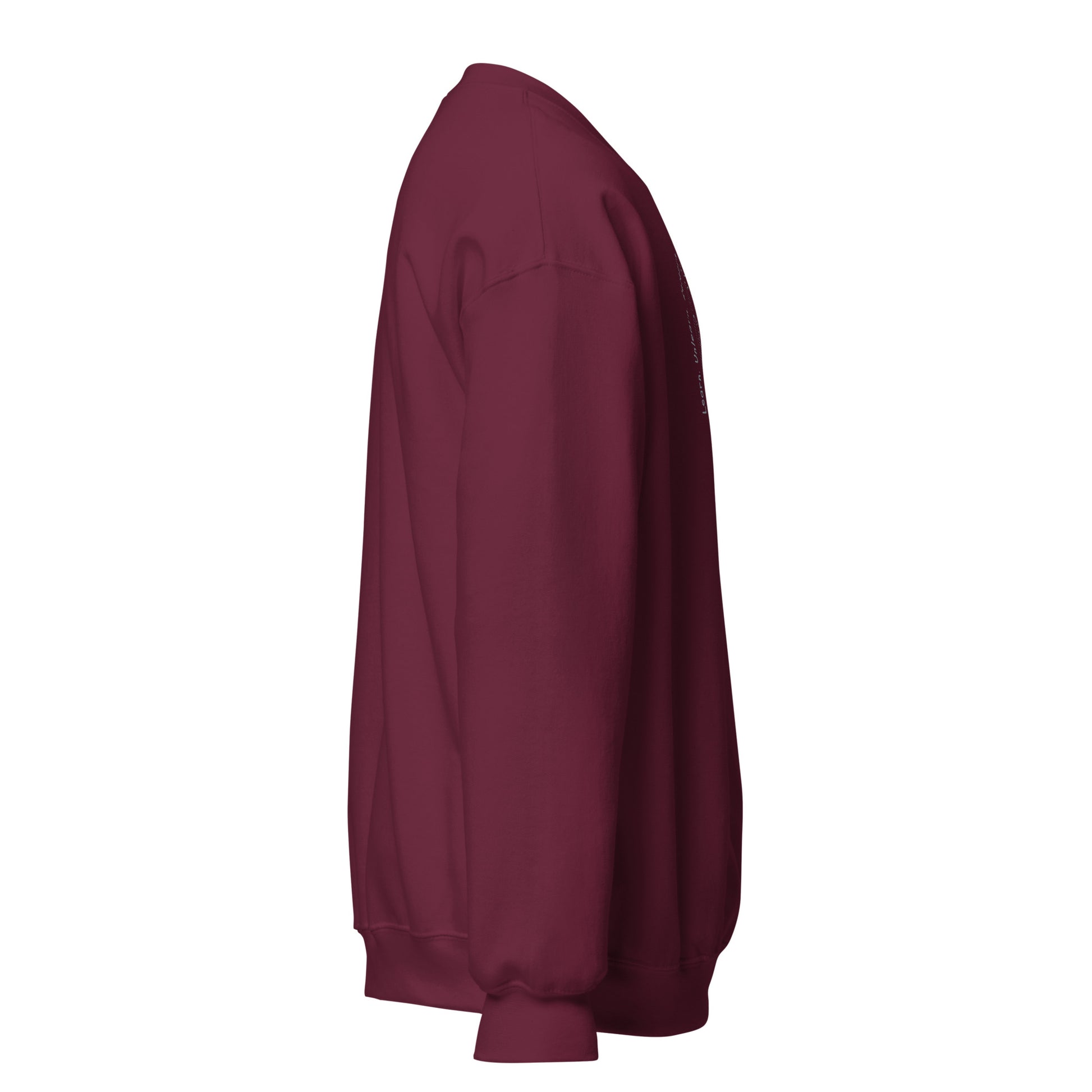 Maroon unisex cotton sweatshirt with “Learn. Unlearn. Relearn.” embroidery and owl design, soft, relaxed fit.