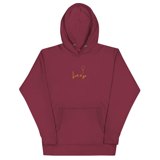 Maroon unisex cotton hoodie with “Let It Be” embroidery; soft, cozy fabric with minimalist design and relaxed fit.