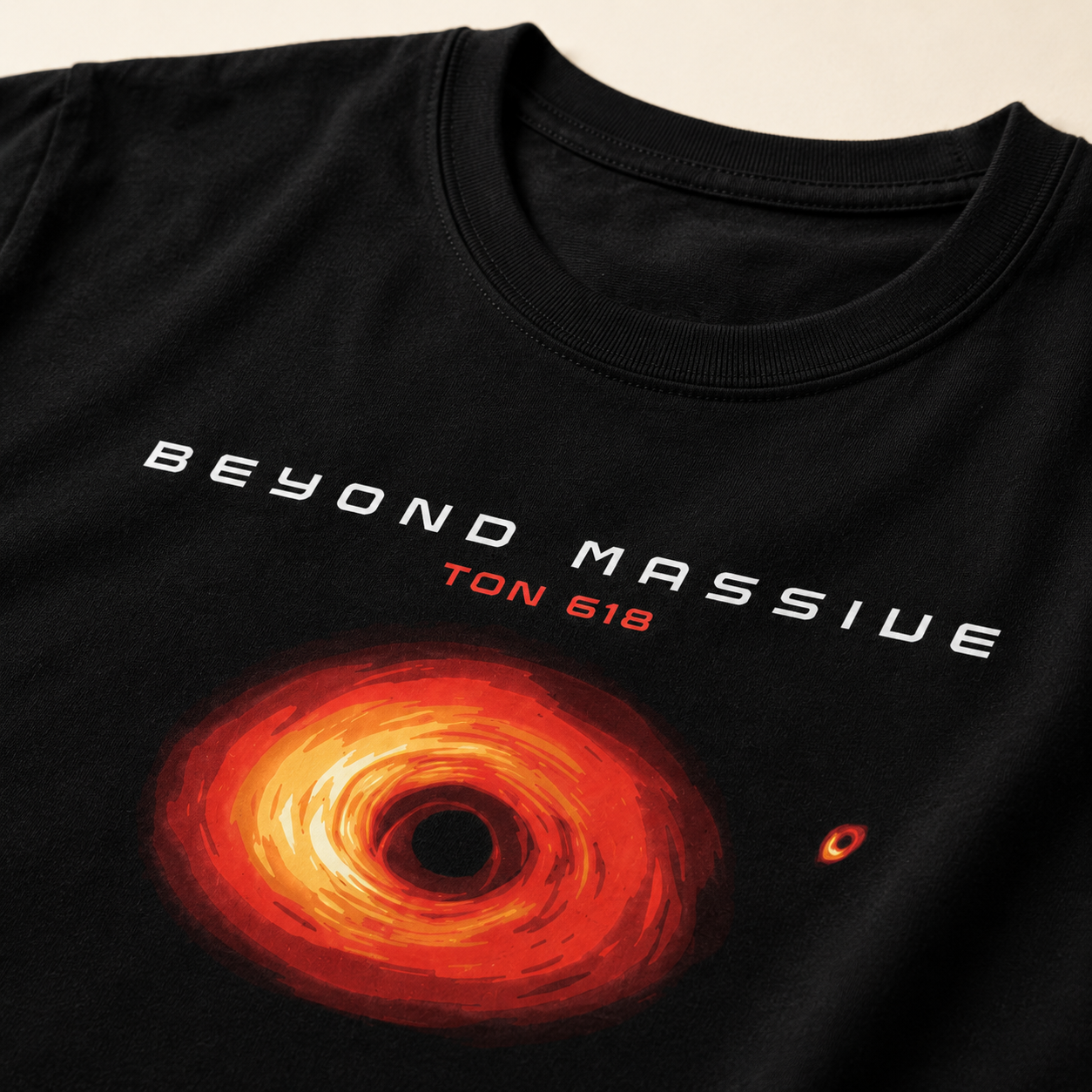 Black t-shirt with a red black hole graphic and 'Beyond Massive TON 618' text on a beige background