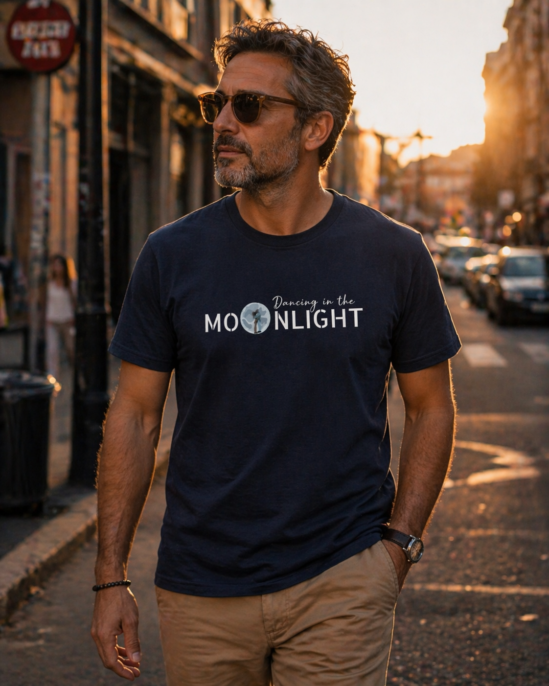 Male model wearing navy Dancing in the Moonlight astronaut t-shirt styled casually