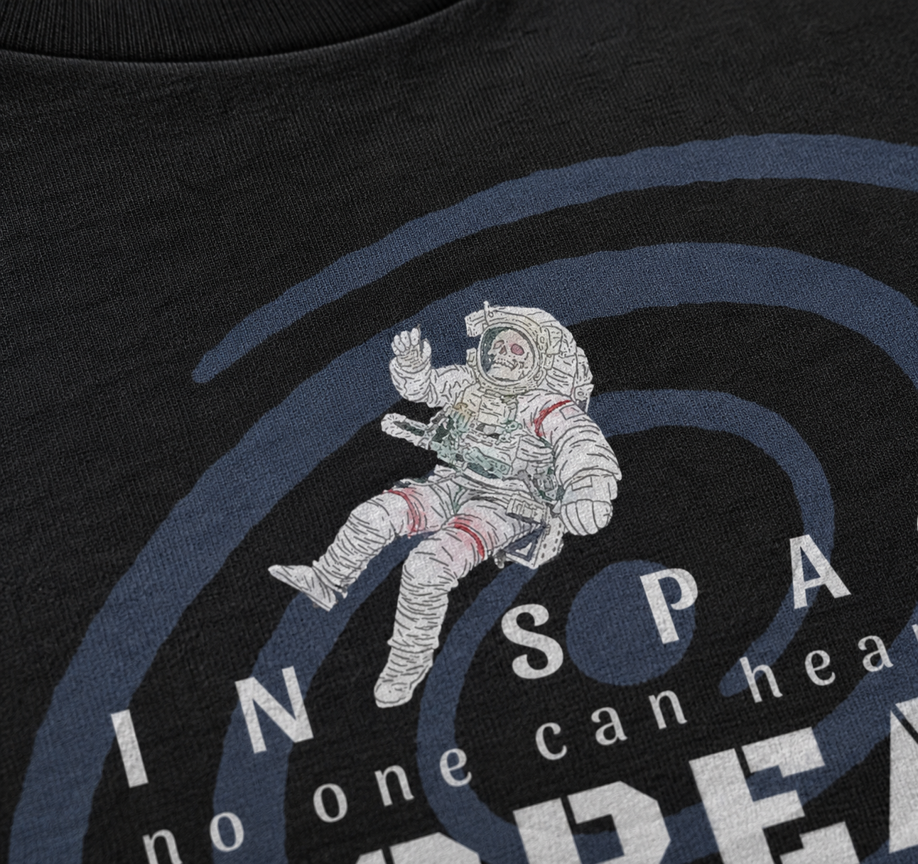 Black t-shirt with a skeleton astronaut graphic and text on a dark background