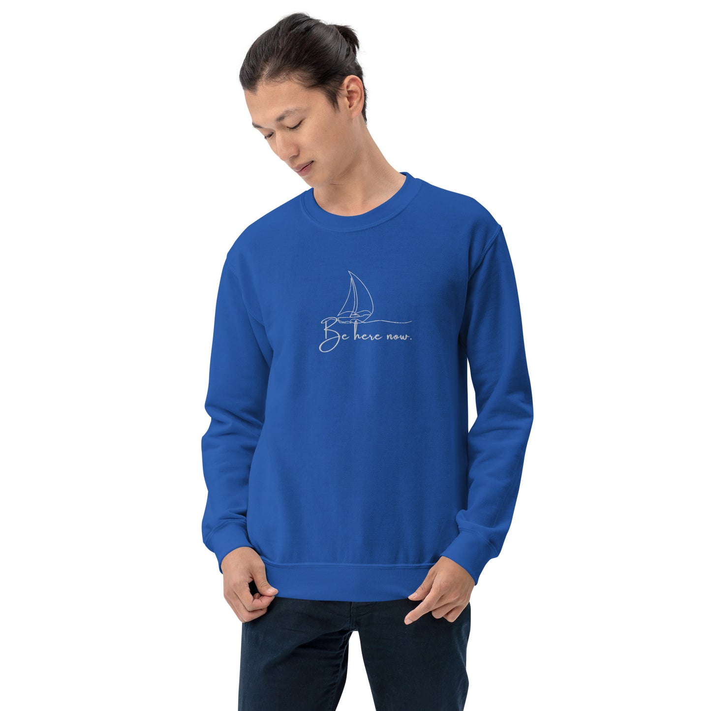 Royal blue unisex cotton sweatshirt with “Be Here Now” embroidery and minimal line sailing boat, soft, relaxed fit.