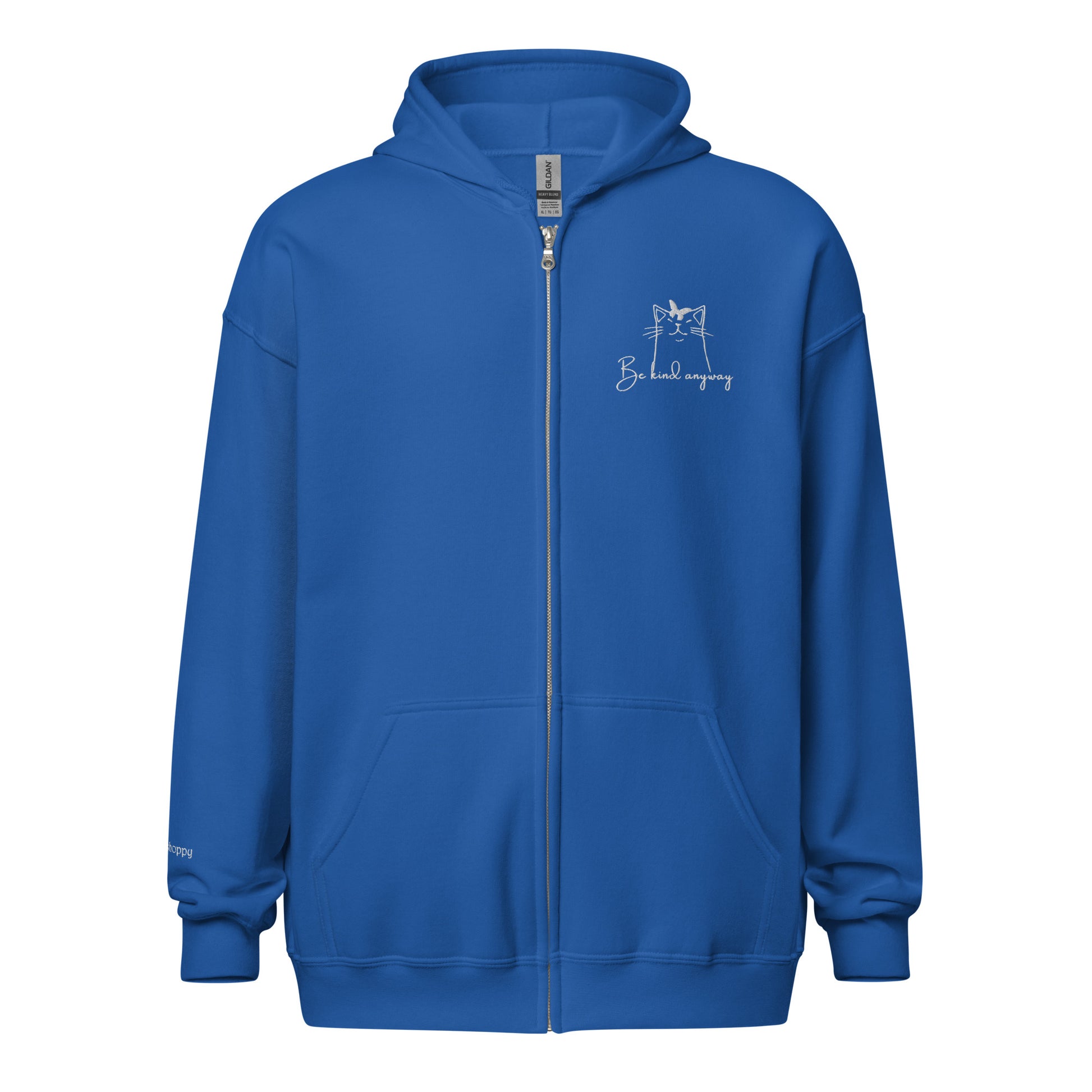 Royal blue embroidered hoodie with “Be Kind Anyway” and simple cat illustration, unisex design celebrating compassion, patience, and warmth.