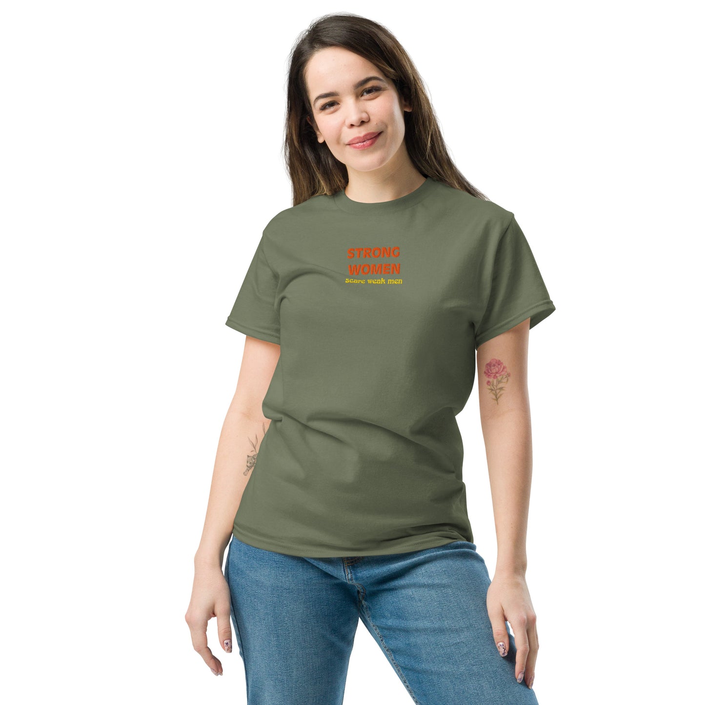 Female model wearing military green “Strong Women Scare Weak Men” unisex cotton T-shirt, celebrating strength and empowerment.