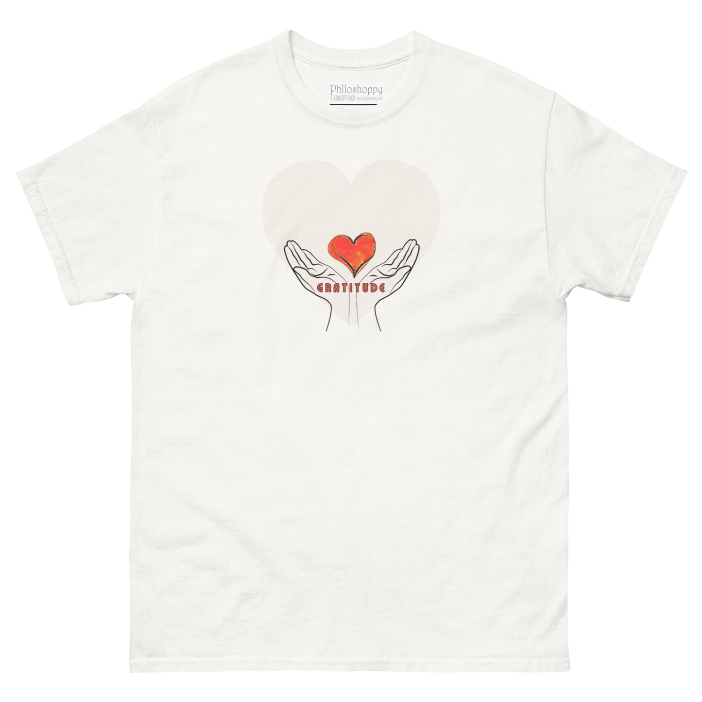 White unisex cotton t-shirt with the word “Gratitude” printed on the front, minimalist design symbolizing mindfulness and appreciation.