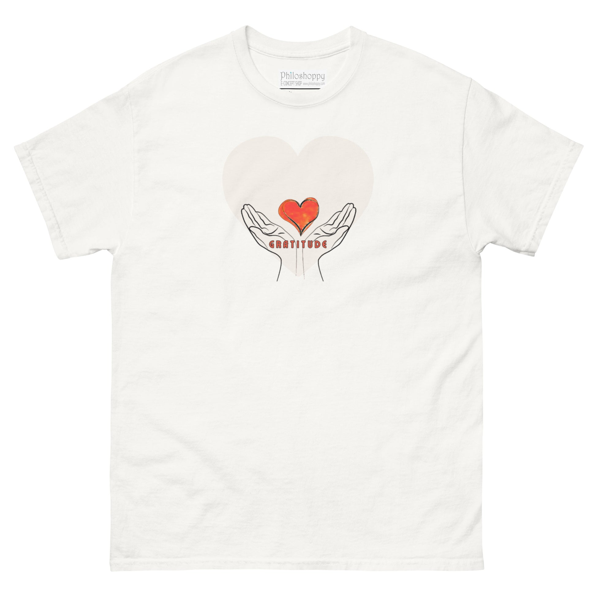 White unisex cotton t-shirt with the word “Gratitude” printed on the front, minimalist design symbolizing mindfulness and appreciation.