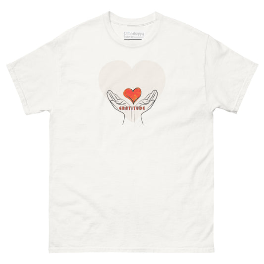 White unisex cotton t-shirt with the word “Gratitude” printed on the front, minimalist design symbolizing mindfulness and appreciation.
