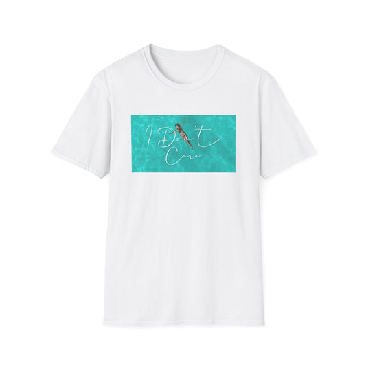 White T-shirt from Philoshoppy featuring a woman swimming in turquoise water with the phrase 'I don't care', symbolizing emotional freedom and the philosophy of letting go.